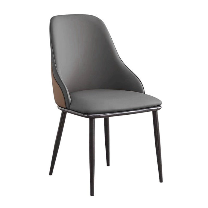Nuriootpa dark grey faux leather dining armchair in a modern dining room