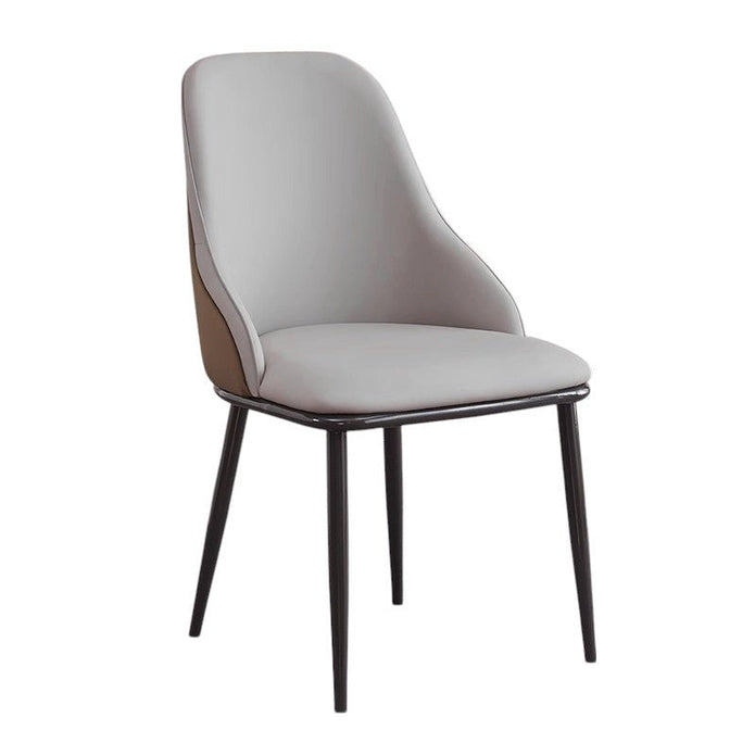 Nuriootpa light grey faux leather dining armchair in a modern dining room