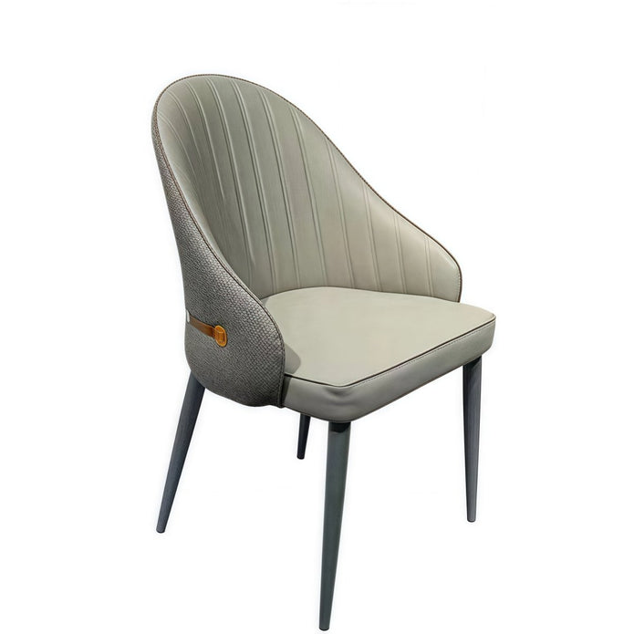 Williamstown grey faux leather dining armchair in a modern dining room