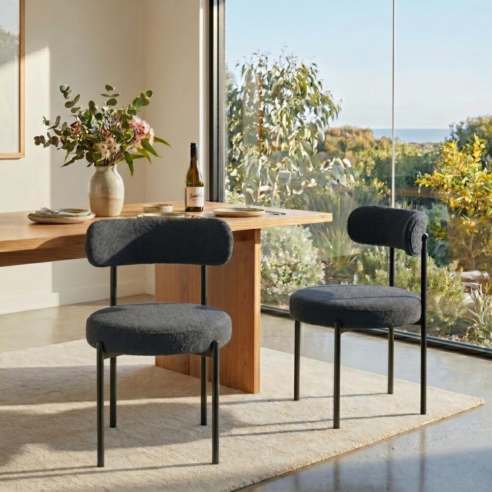Angaston charcoal boucle dining chair in a modern dining room