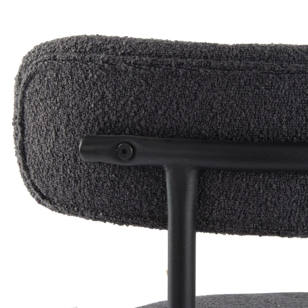 Angaston charcoal boucle dining chair in a modern dining room