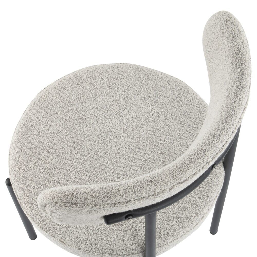 Angaston white boucle dining chair in a modern dining room