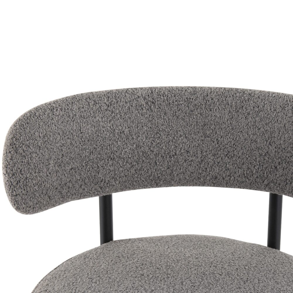 Pair of Elsa grey boucle low bar stools in cafe-style dining setting — Allure Home Collections