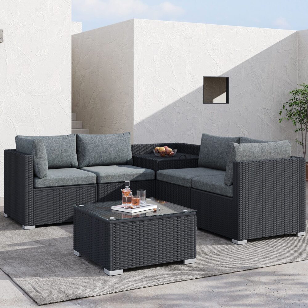 Peregian black wicker outdoor lounge set on a sunny patio