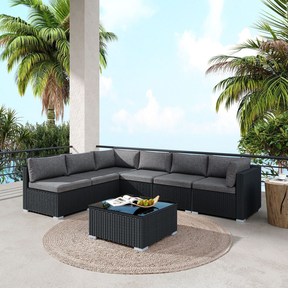 Mooloolaba black wicker outdoor lounge set on a sunny patio