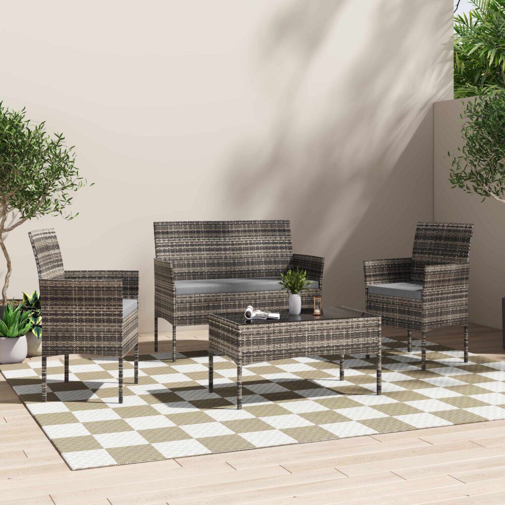 Buddina grey wicker outdoor lounge set on a sunny patio