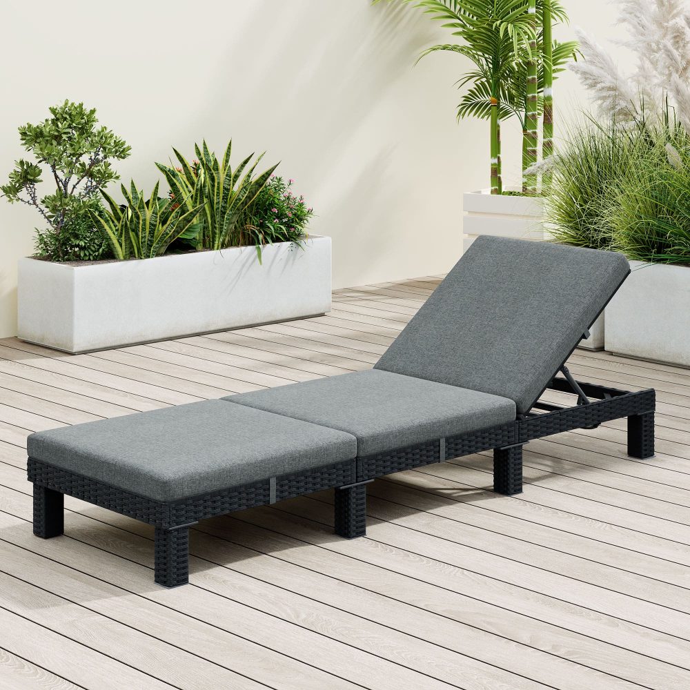 Kings Beach black wicker outdoor lounge set on a sunny patio