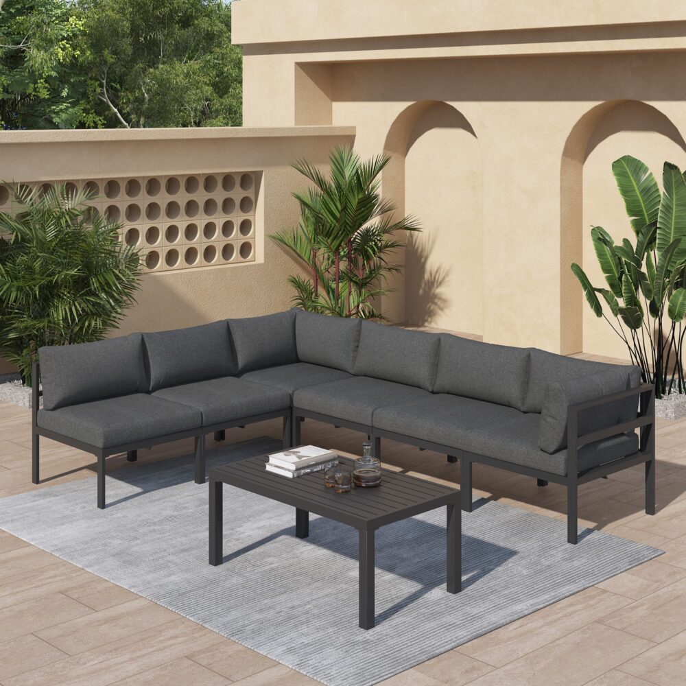 Wurtulla charcoal grey aluminium outdoor lounge set on a sunny patio