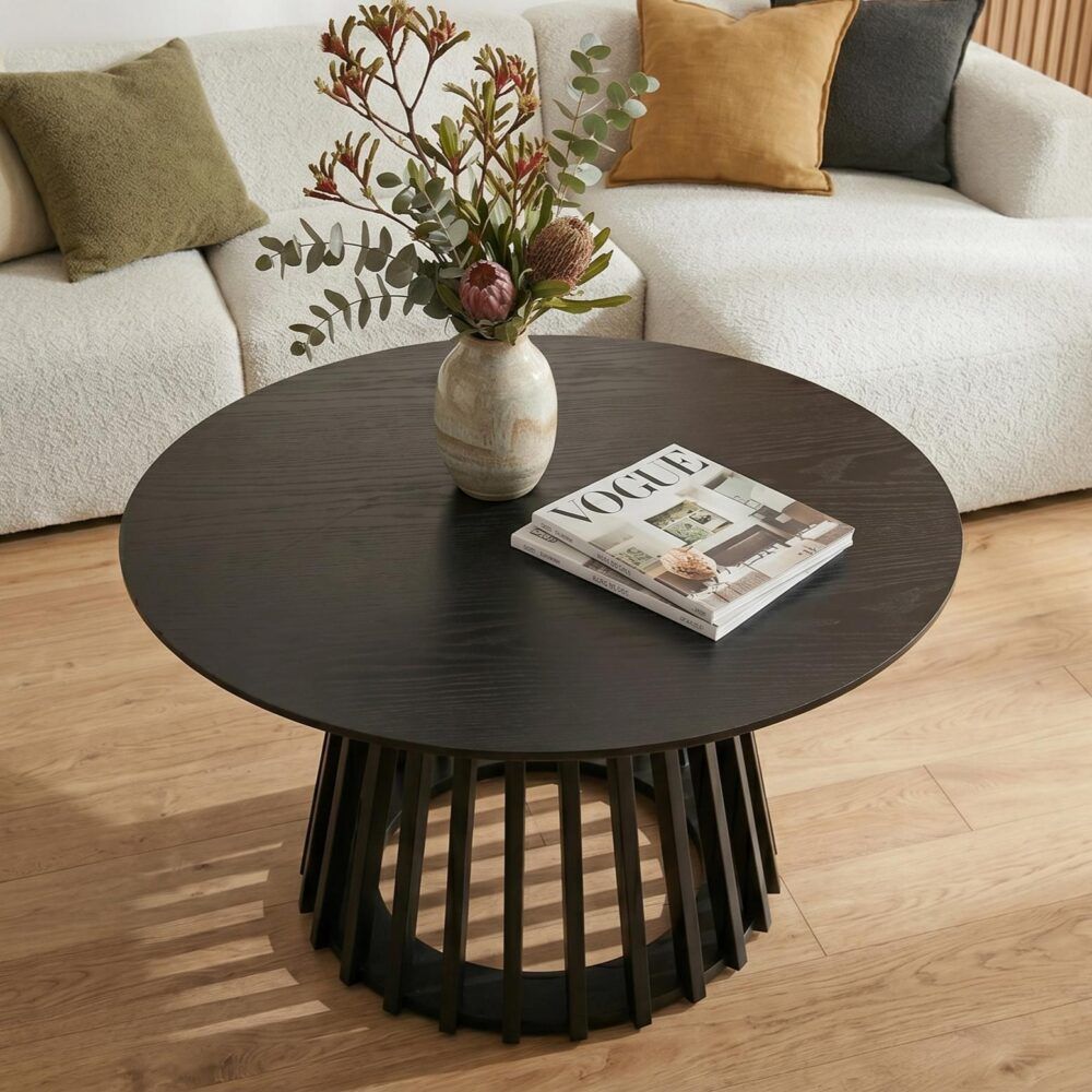 Molesworth matte black timber coffee table in a modern living room