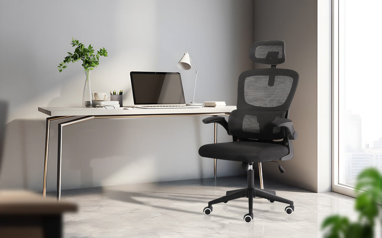 Bridgetown black mesh office chair with flip up armrests in a home office