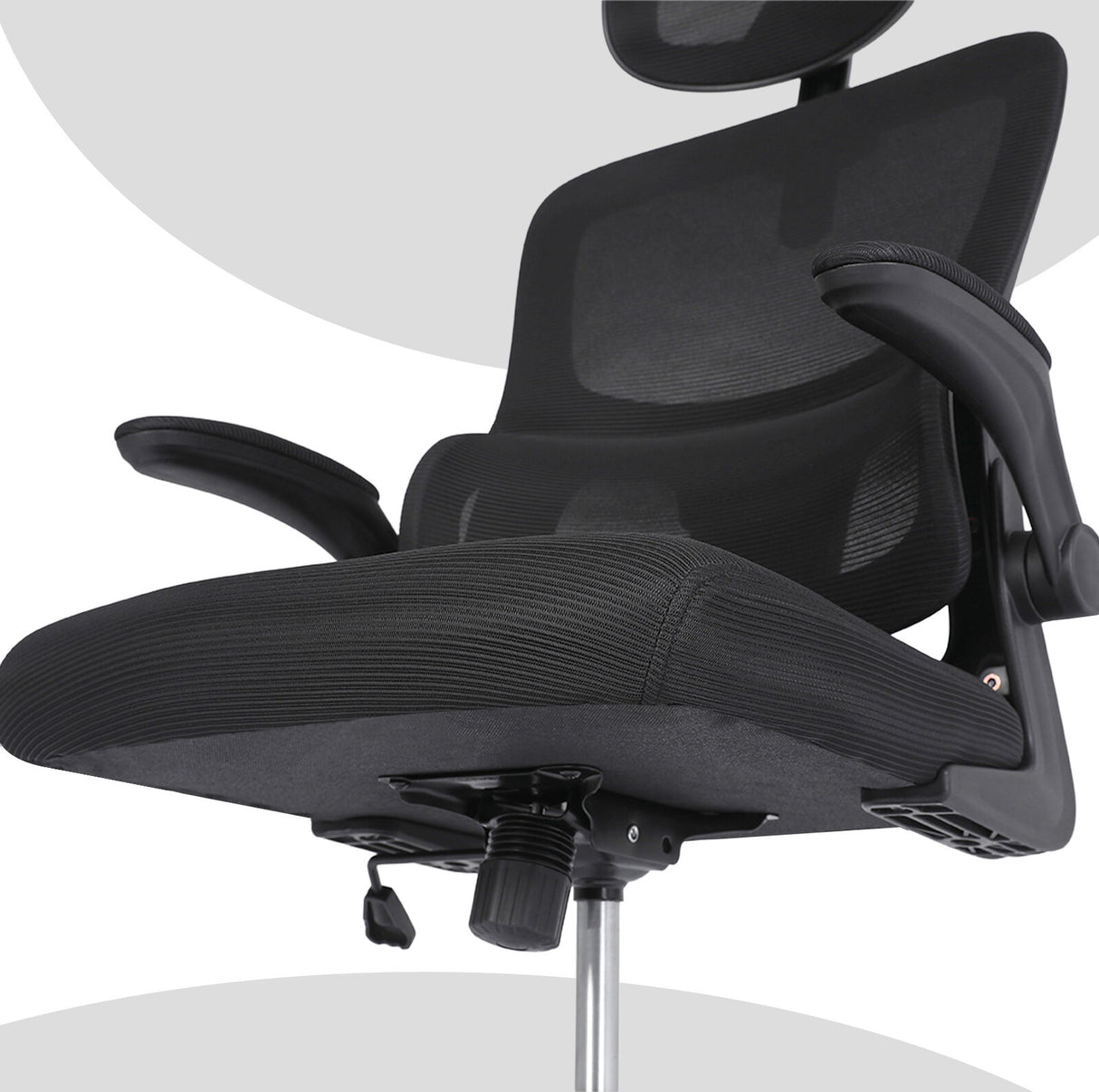 Bridgetown black mesh office chair with flip up armrests in a home office
