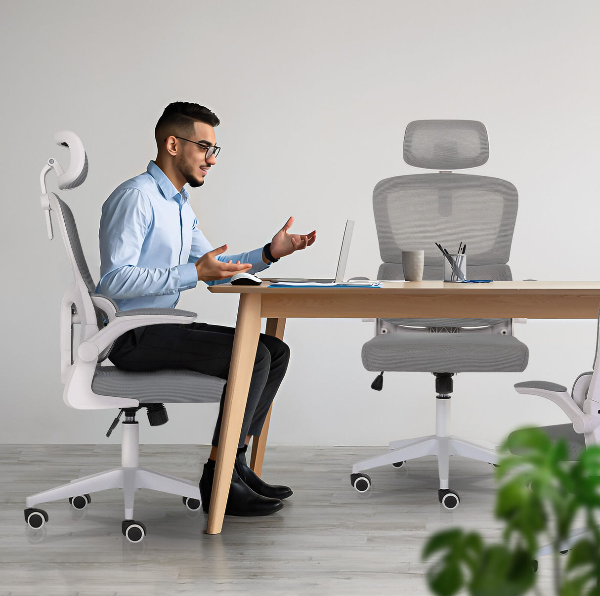 Bridgetown grey mesh office chair with flip up armrests in a home office