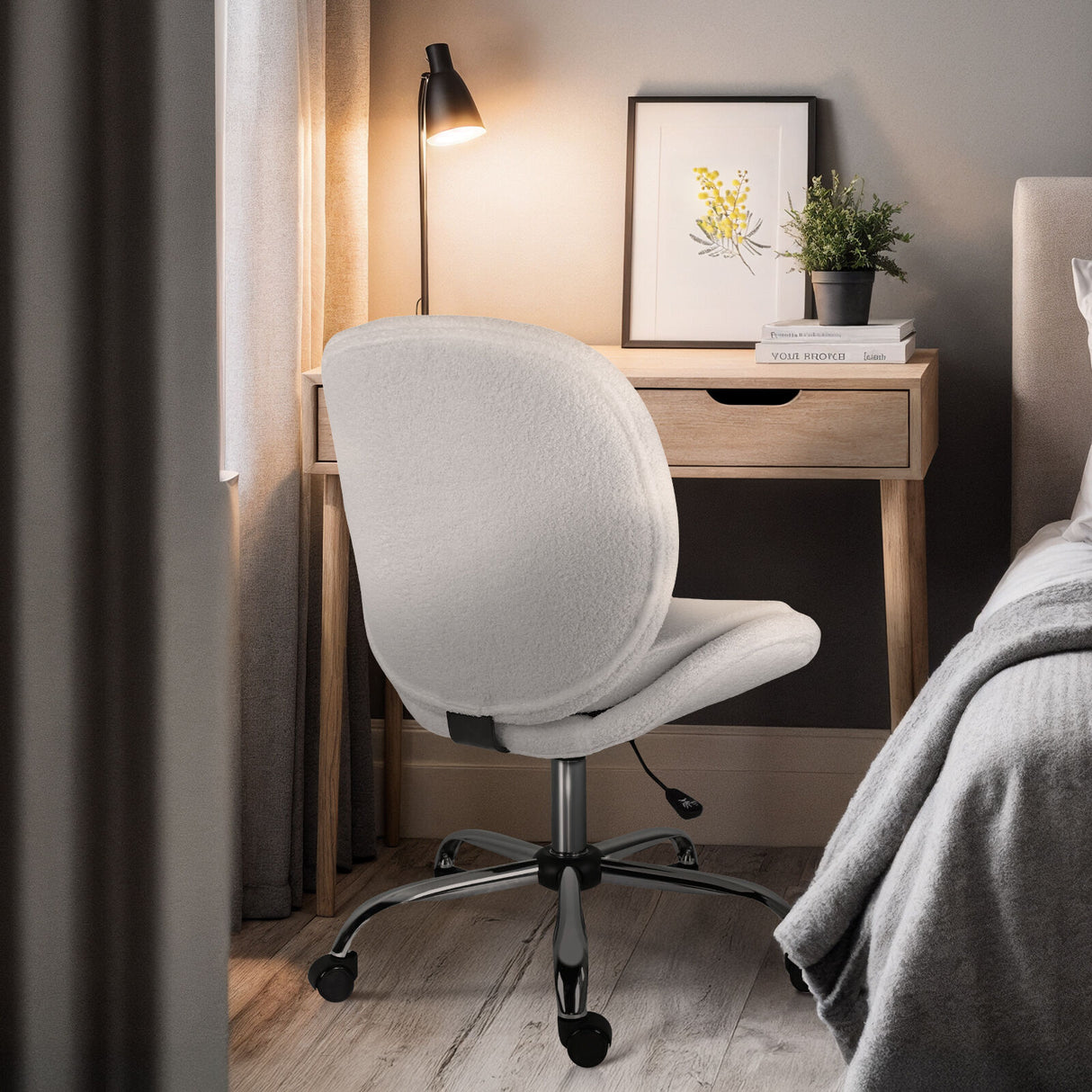 Scarborough white teddy boucle armless swivel office chair at a desk