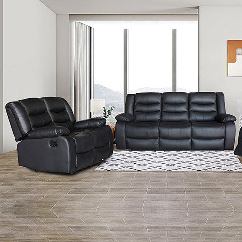 Nerja black faux leather recliner sofa in a modern living room