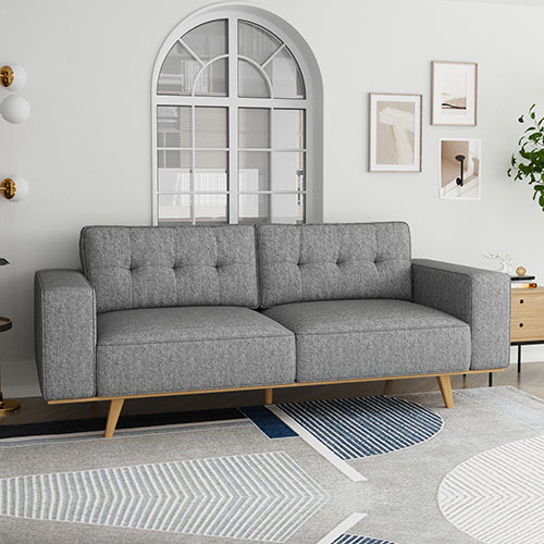 Competa grey fabric sofa in a modern living room