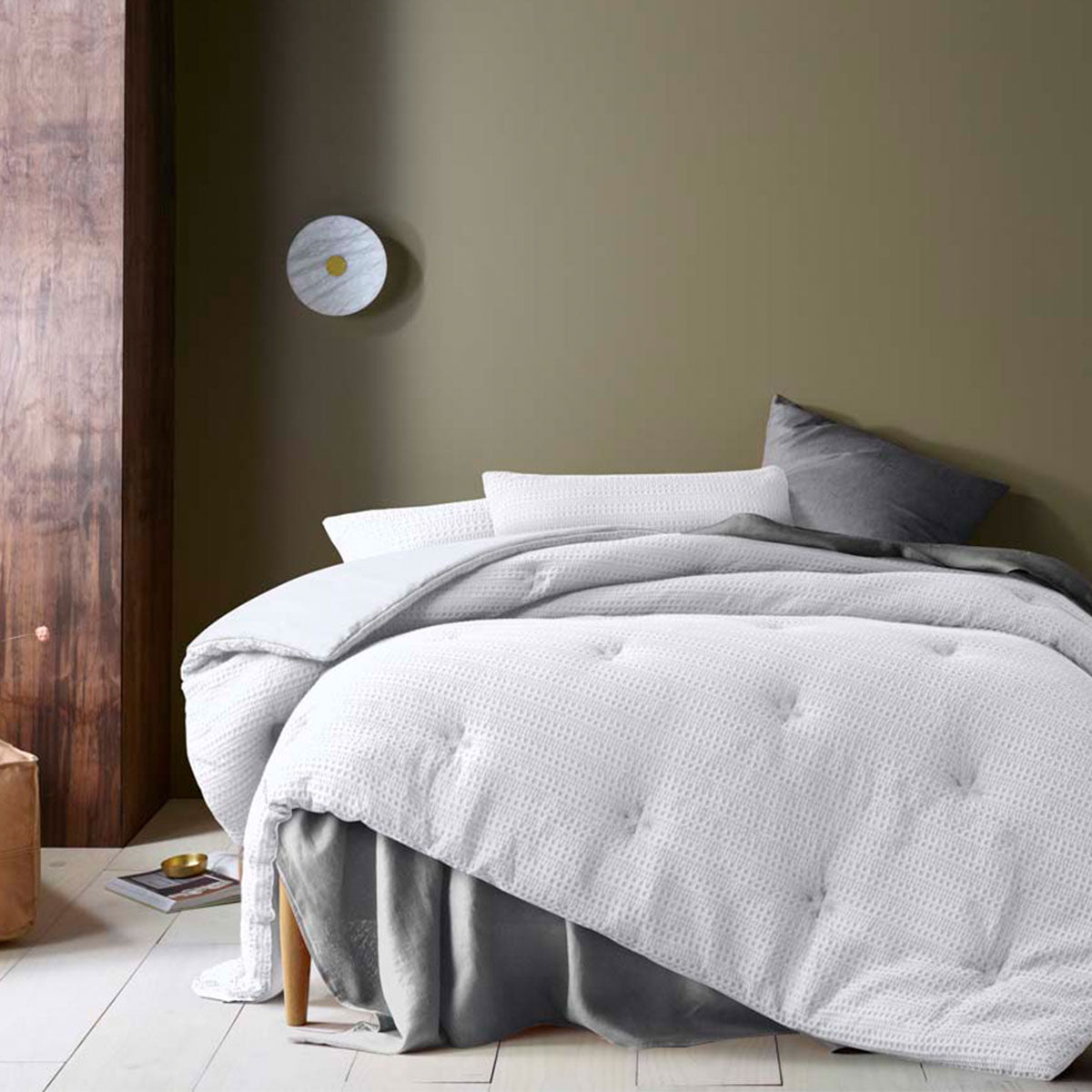 Woodmancote white waffle weave comforter set on a Queen bed with two pillowcases