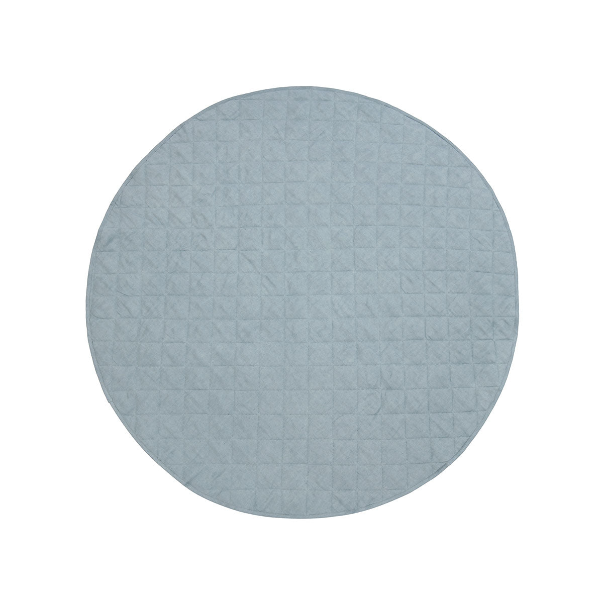 Detail of quilted French linen top on round baby play mat