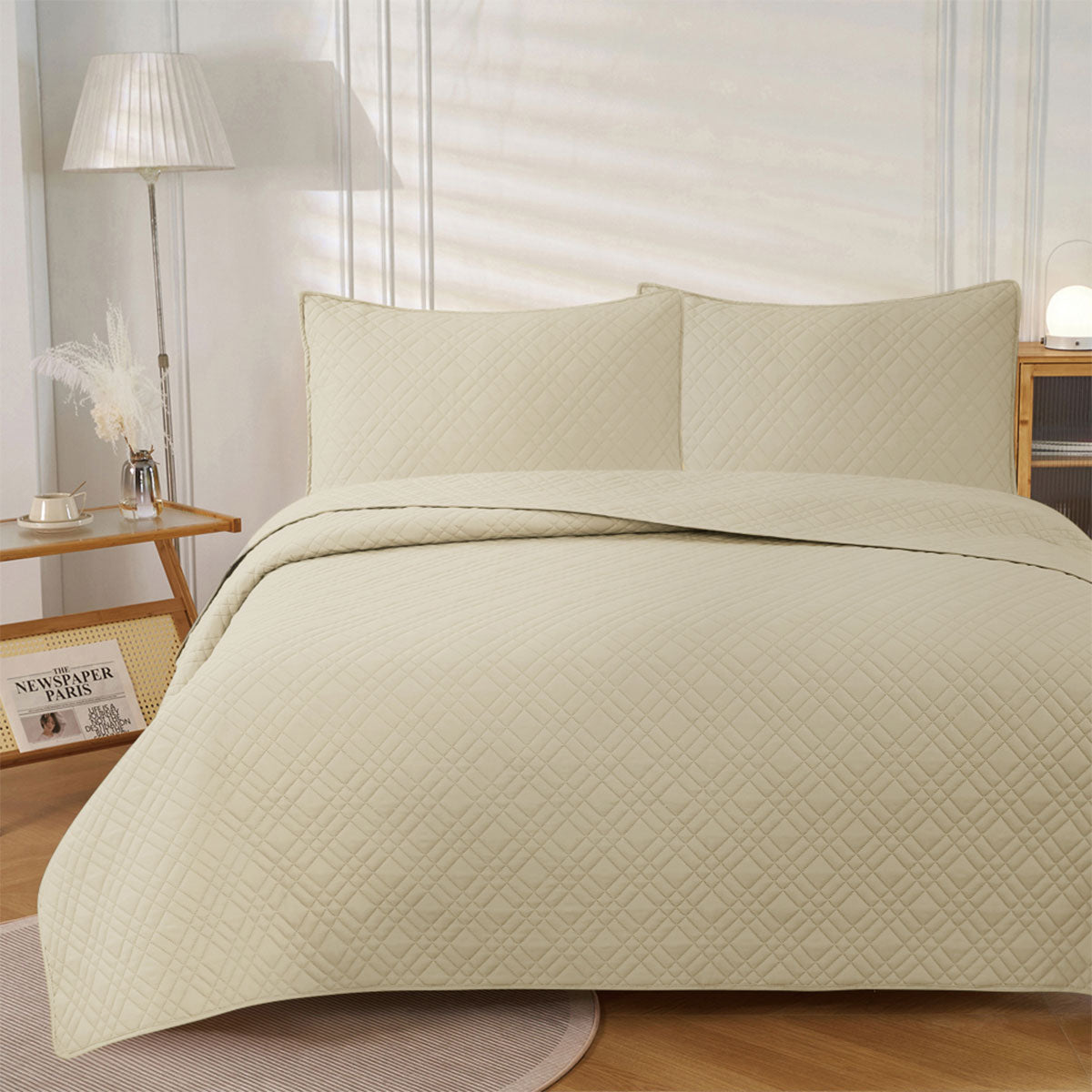 Frampton on Severn beige embossed reversible coverlet on a Queen bed