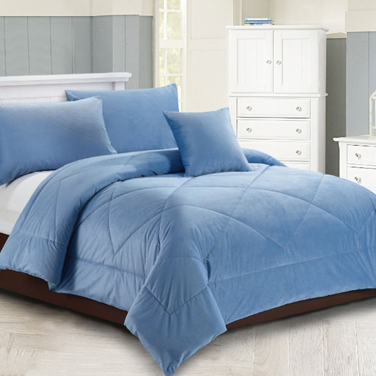 Dowdeswell chambray blue diamond quilted comforter set on a Super King bed with two pillowcases