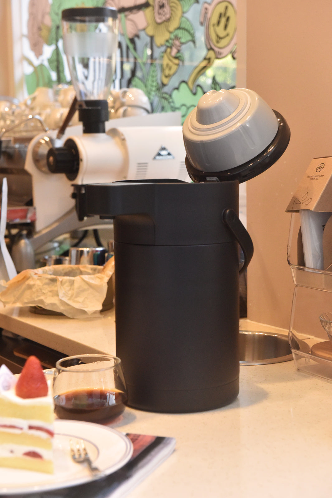 Top view of air press pot lid with push button pump dispenser, black finish