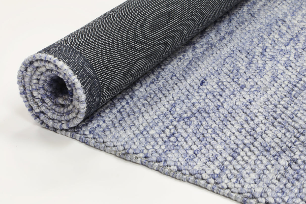 Textured wool blend floor rug in blue, 200 x 290 cm