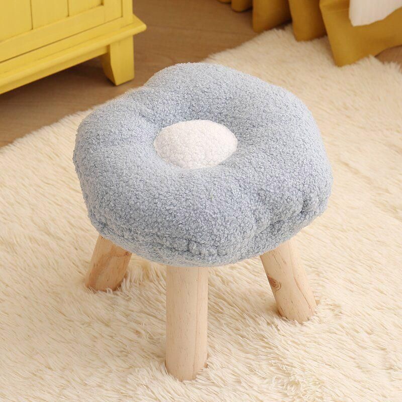 Flower shaped plush footstool in yellow