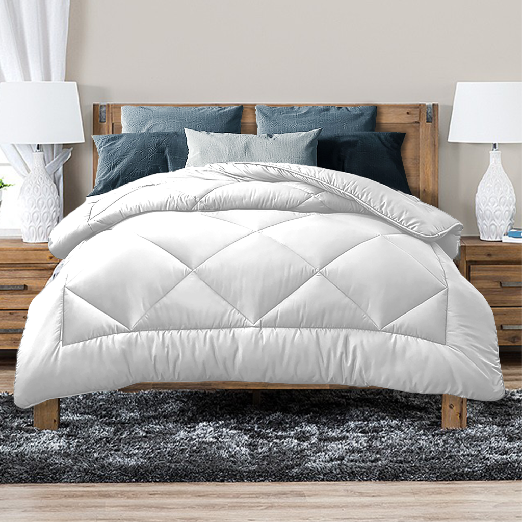 Boxwell bamboo blend quilt with diamond stitching on a Super King bed