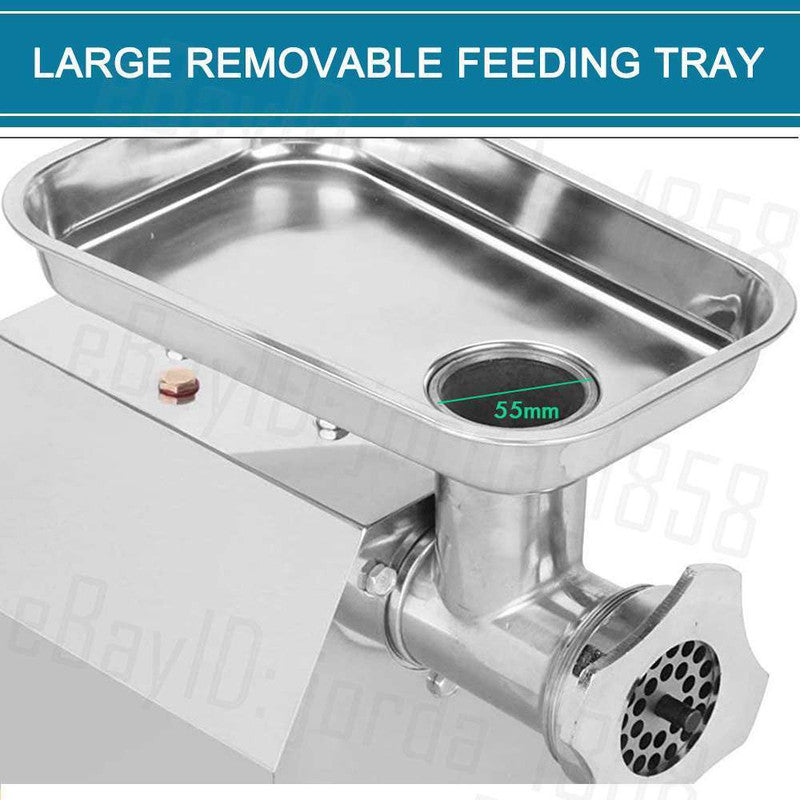 Meat mincer in a commercial kitchen setting on a stainless steel bench