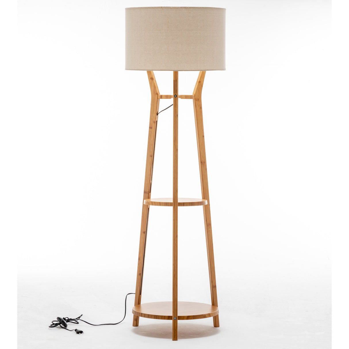 Bamboo tripod floor lamp with linen shade and storage shelves