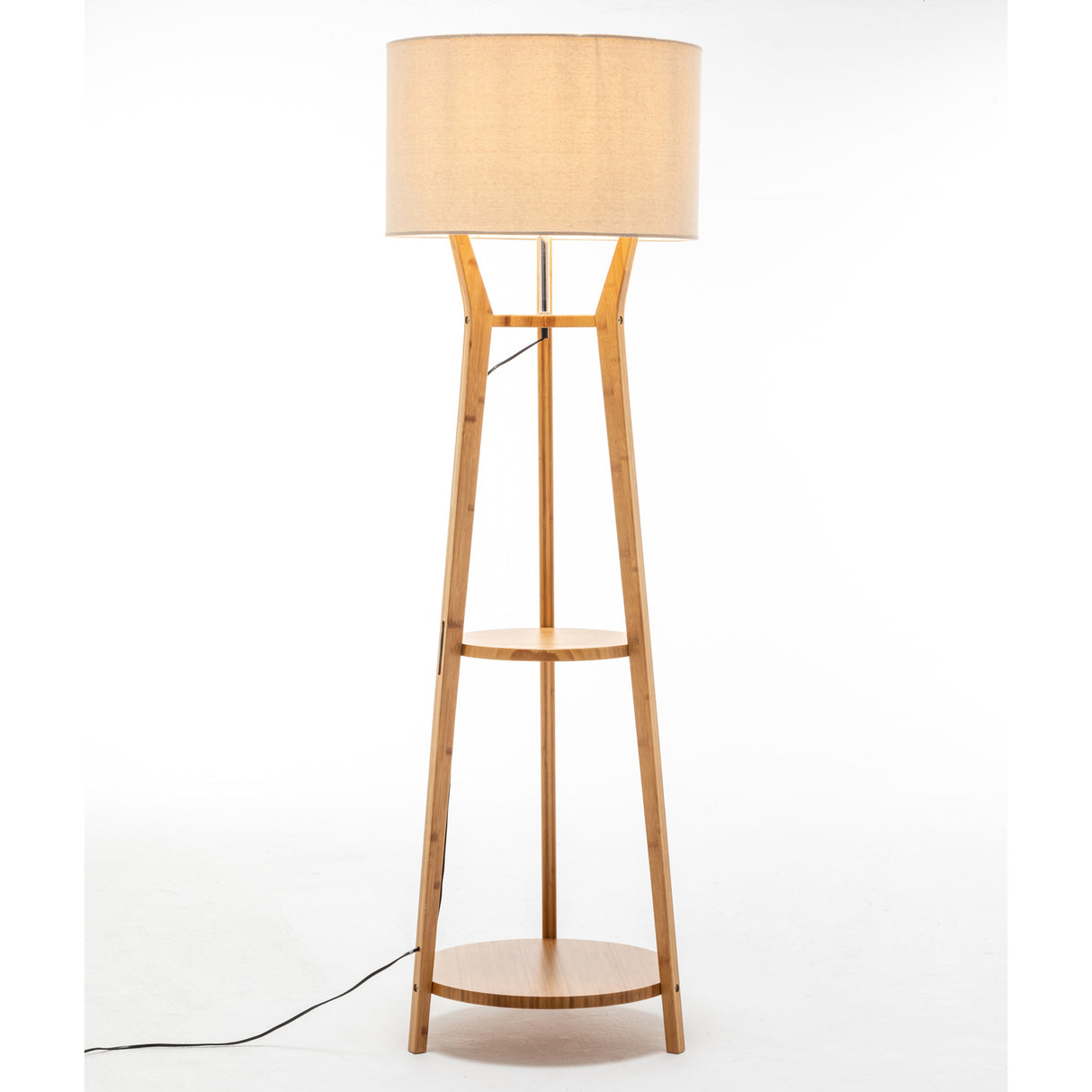 Bamboo tripod floor lamp with linen shade and storage shelves