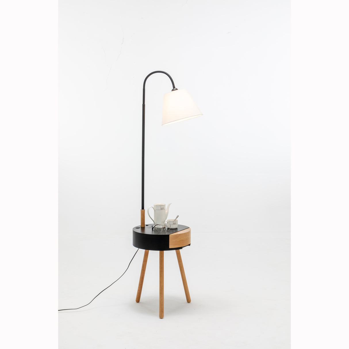 Tripod floor lamp with storage drawer, USB charger and off white linen shade