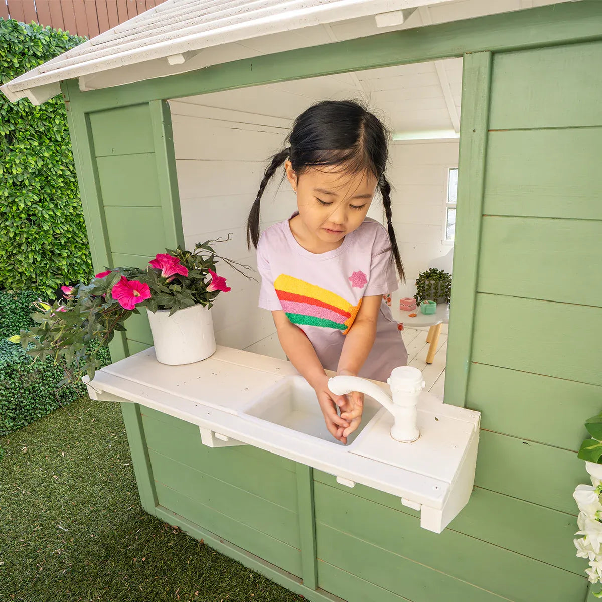 Wooden Cubby House with Veranda and Flower Bed