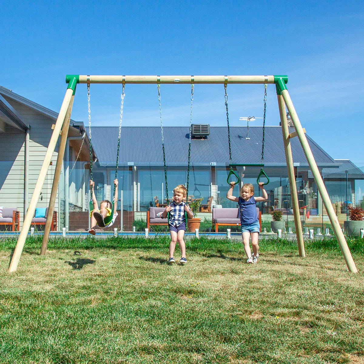 Timber swing set with two swings and trapeze view 1