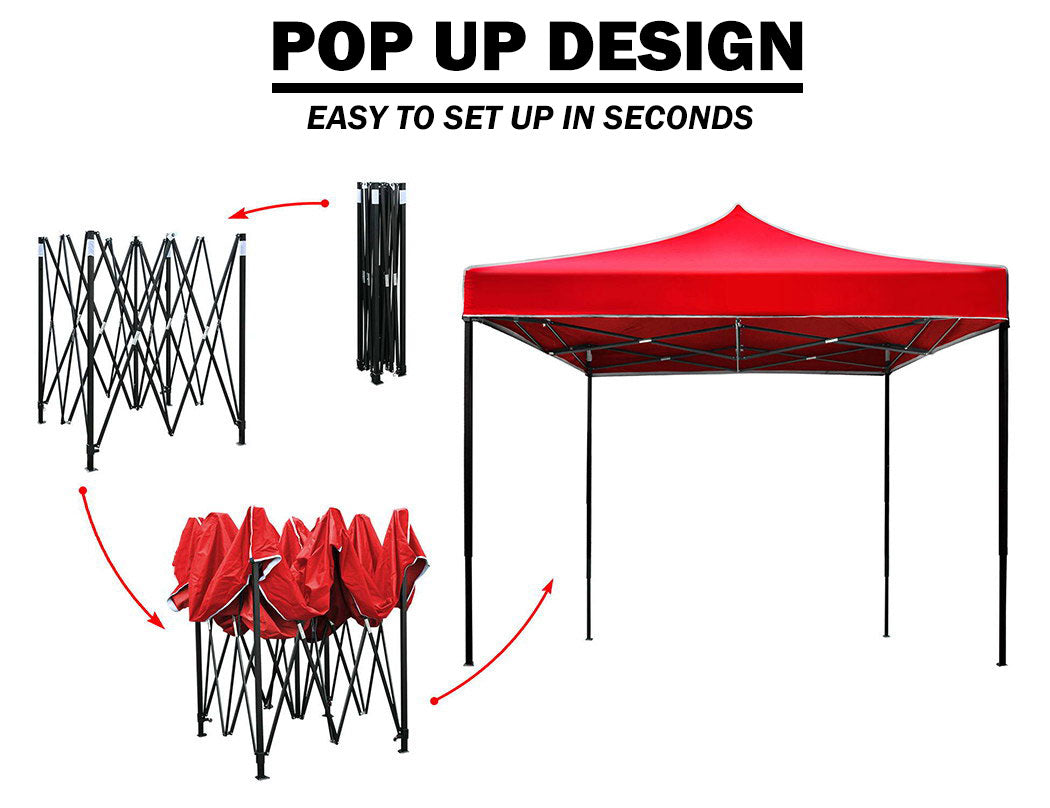 Red gazebo with side walls set up over an outdoor stall