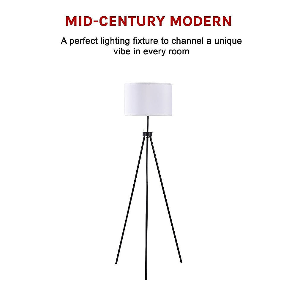 Mid century tripod floor lamp with ivory drum shade and black legs