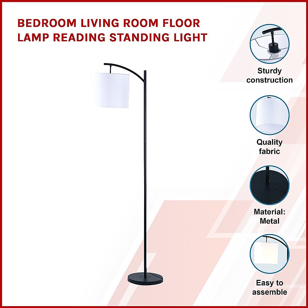 Arched floor lamp with ivory drum shade and black metal stand