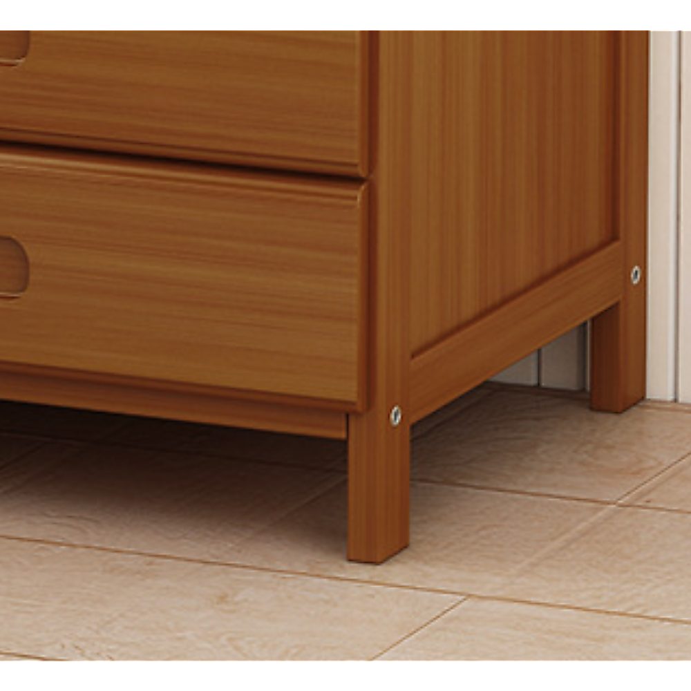 Mullumbimby dark wood bamboo three drawer bedside table with open shelf in a bright bedroom