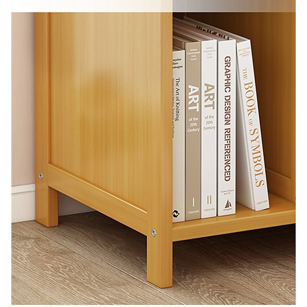 Ocean Shores natural compact bamboo bedside table with drawer and shelf in a bedroom