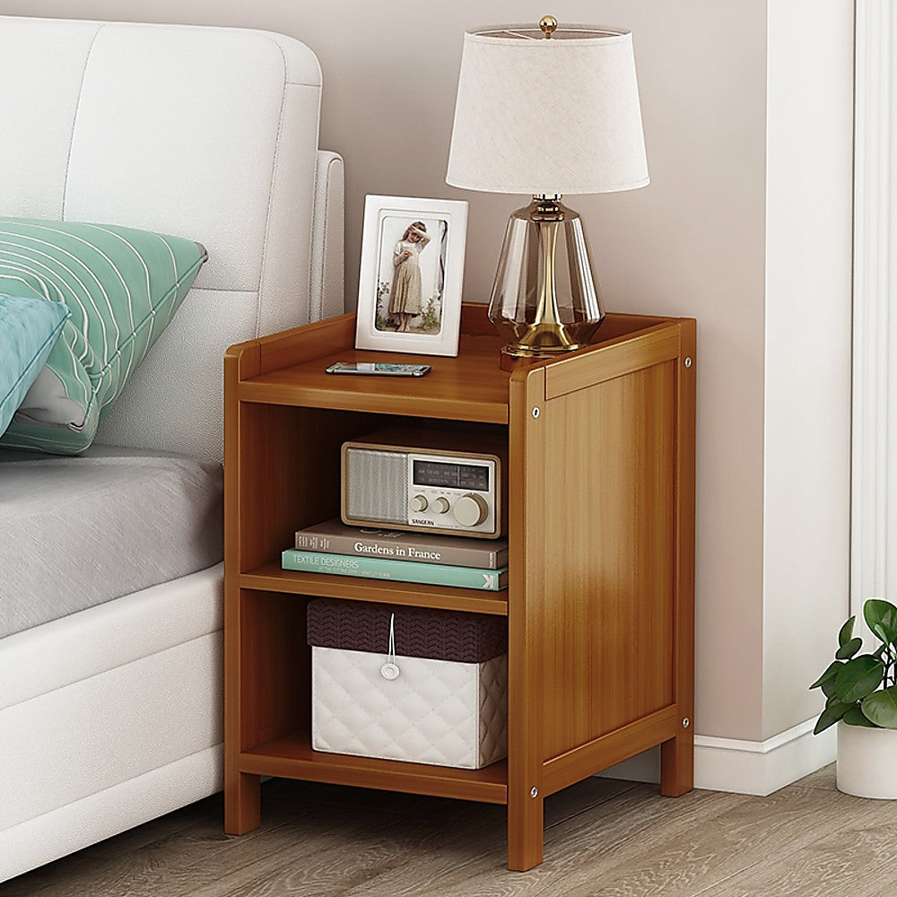 Ocean Shores dark wood compact bamboo bedside table with drawer and shelf in a bedroom