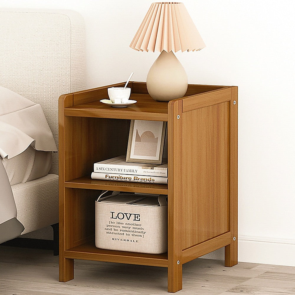 Ocean Shores dark wood compact bamboo bedside table with drawer and shelf in a bedroom