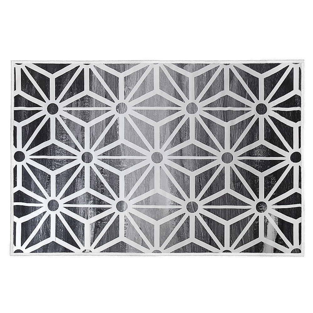 Geometric polypropylene floor rug black and white 200x300cm