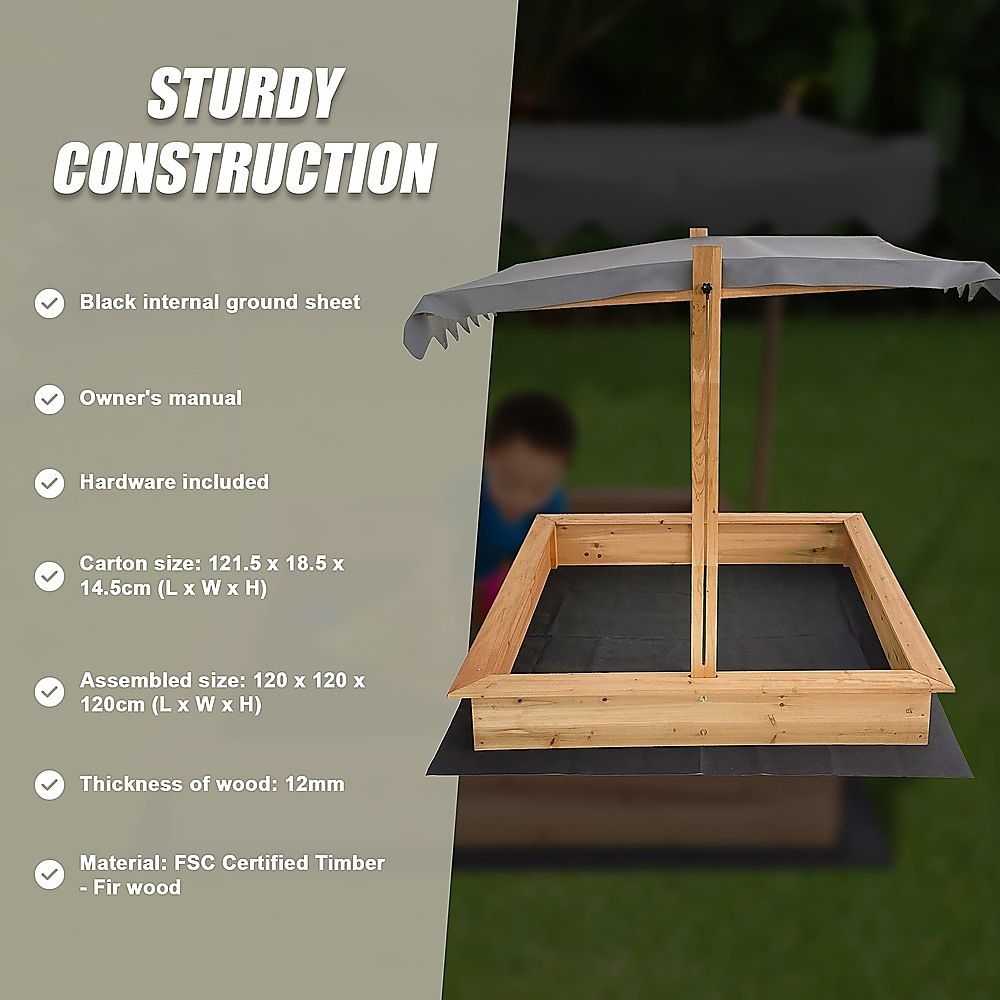 Wooden sandpit interior with ground sheet