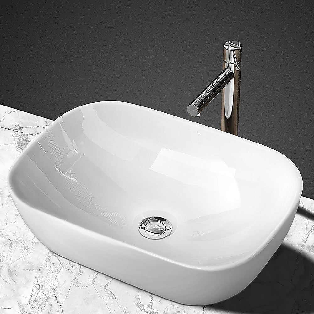 High gloss ceramic oval above counter basin, front view, 46x33cm