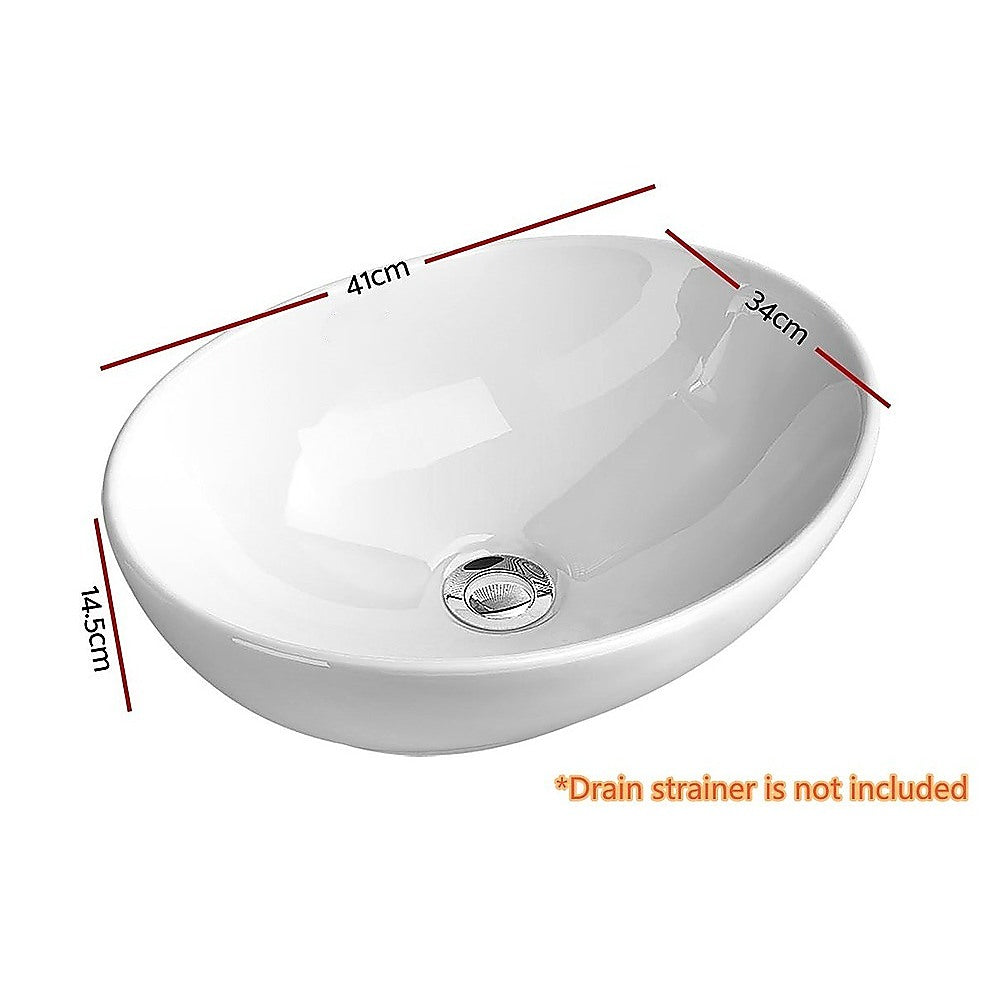 White oval ceramic above counter basin styled on vanity