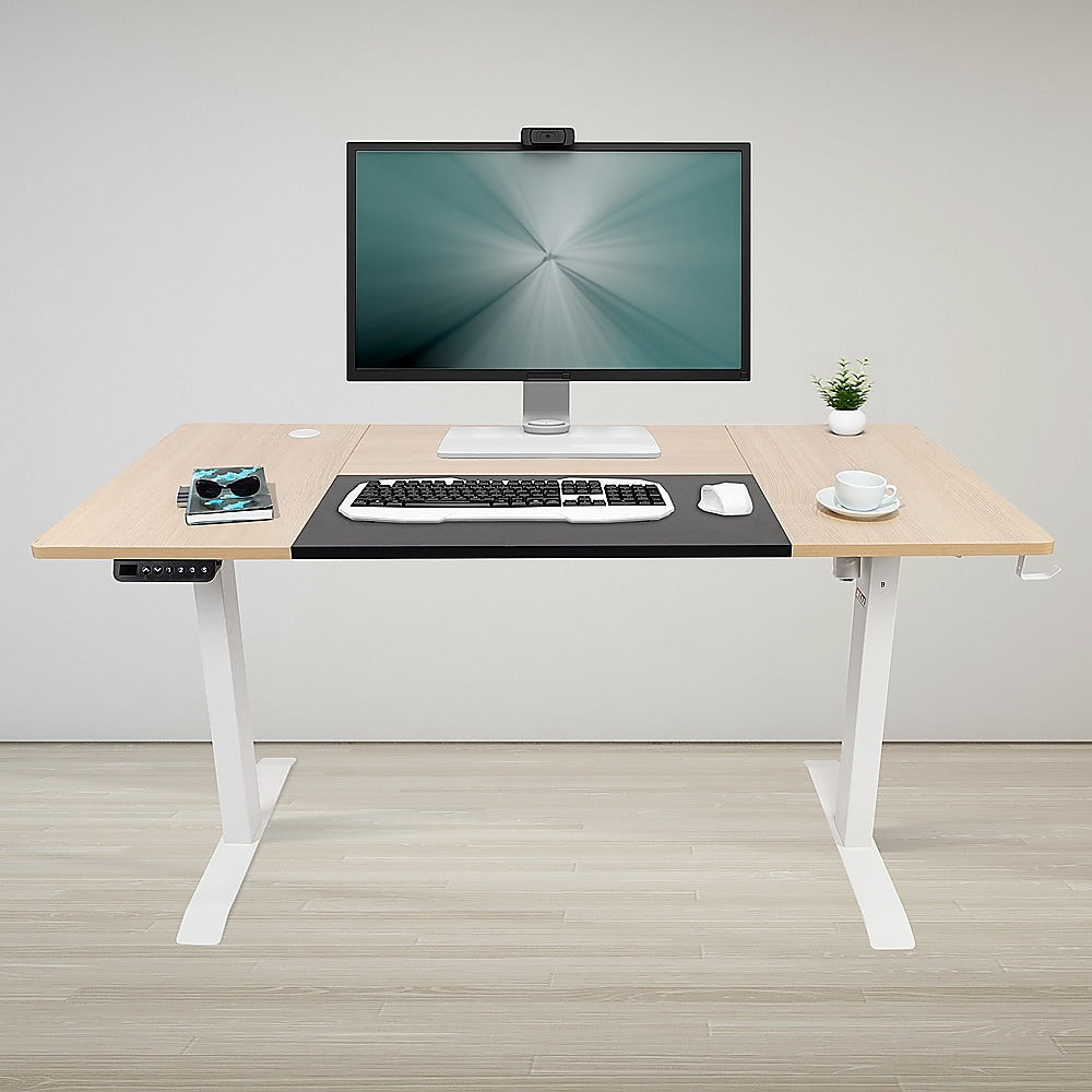 Hackett light birchwood standing desk in a home office