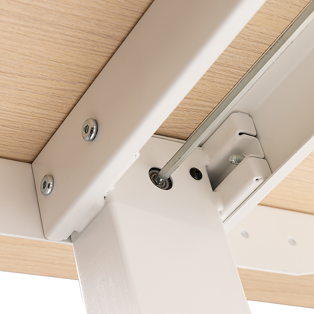 Hackett light birchwood standing desk in a home office
