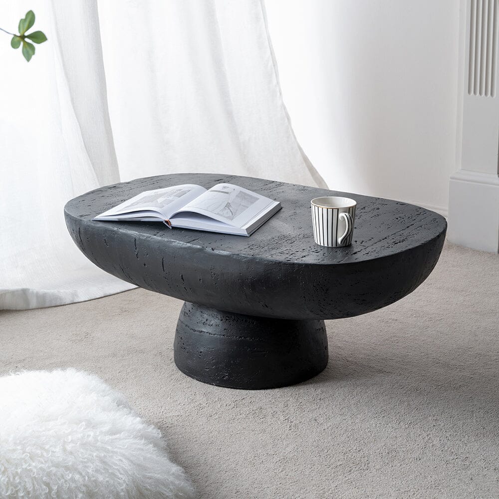 Panton Hill black cement coffee table in a modern living room