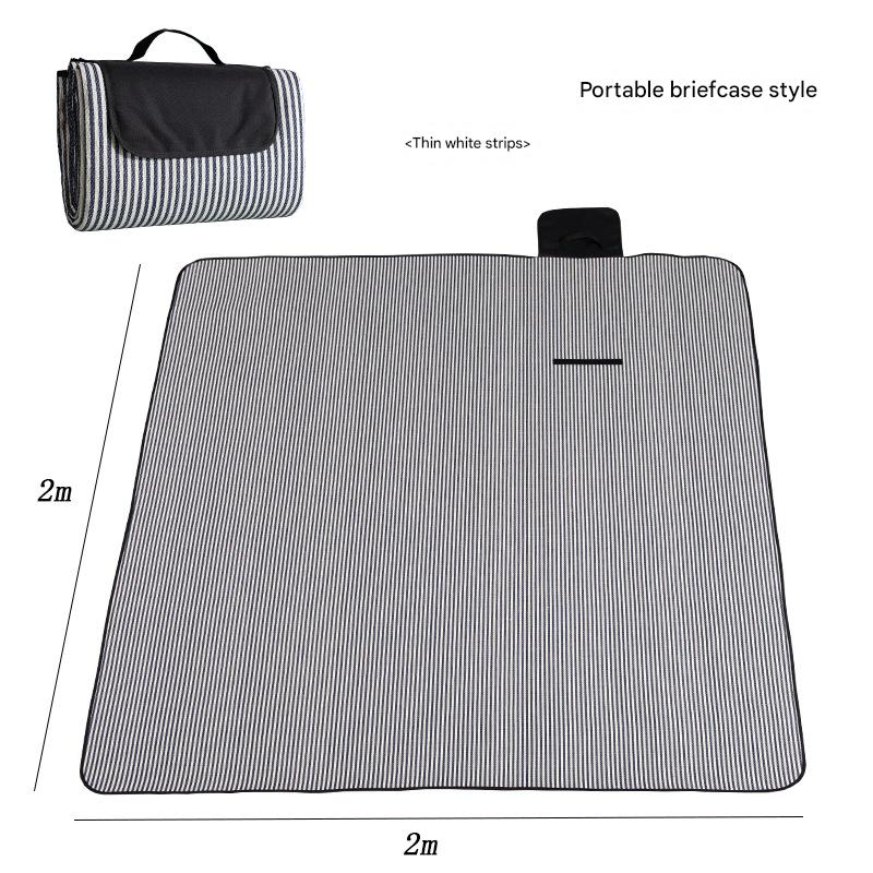 Hawkshead picnic blanket 200 x 200cm in white thin stripe print laid on grass with soft fabric top and water resistant PEVA backing