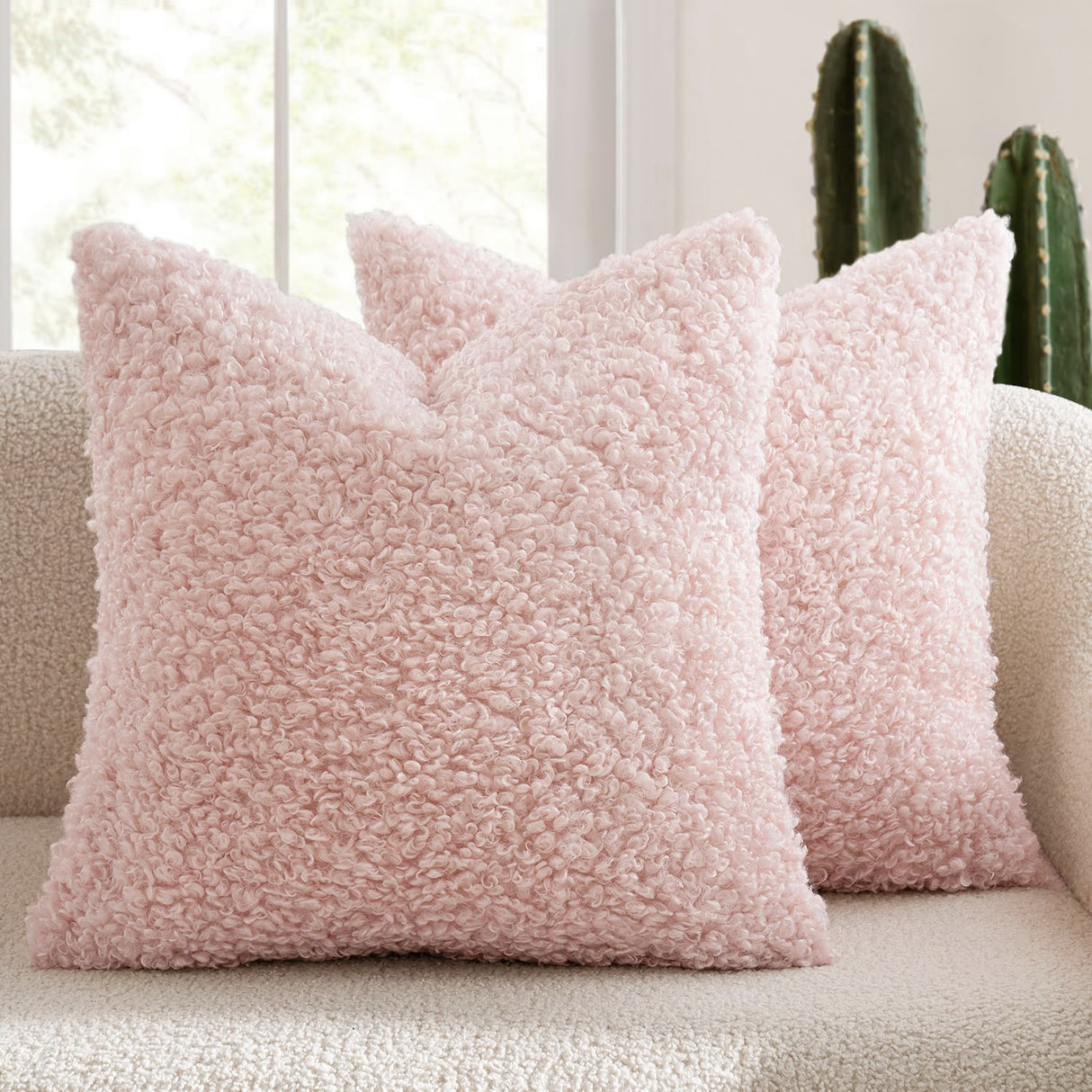 Dunkeld pink teddy boucle decorative cushion covers on a styled sofa