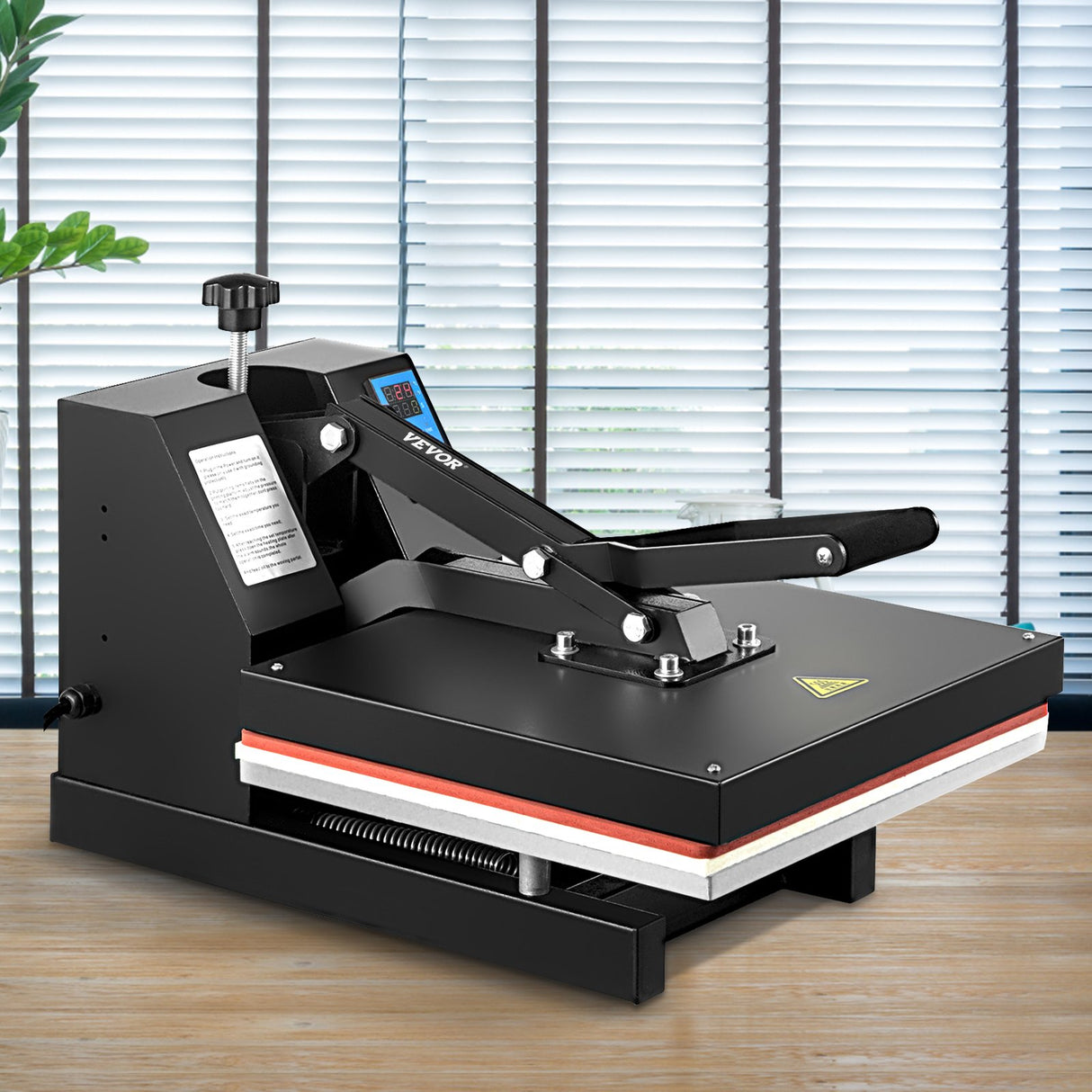 Handle and locking mechanism of the clamshell heat press